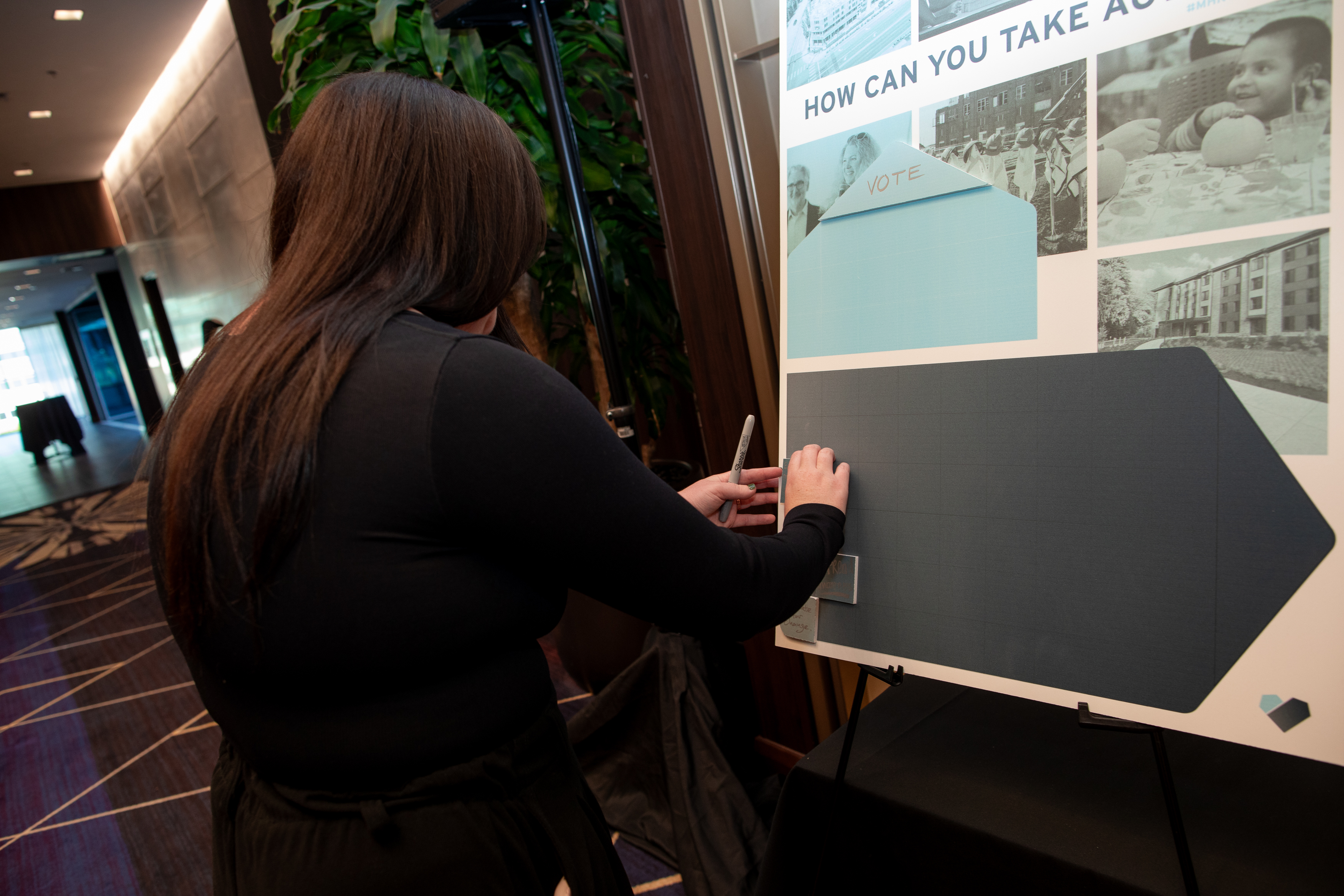 A lady with an image board